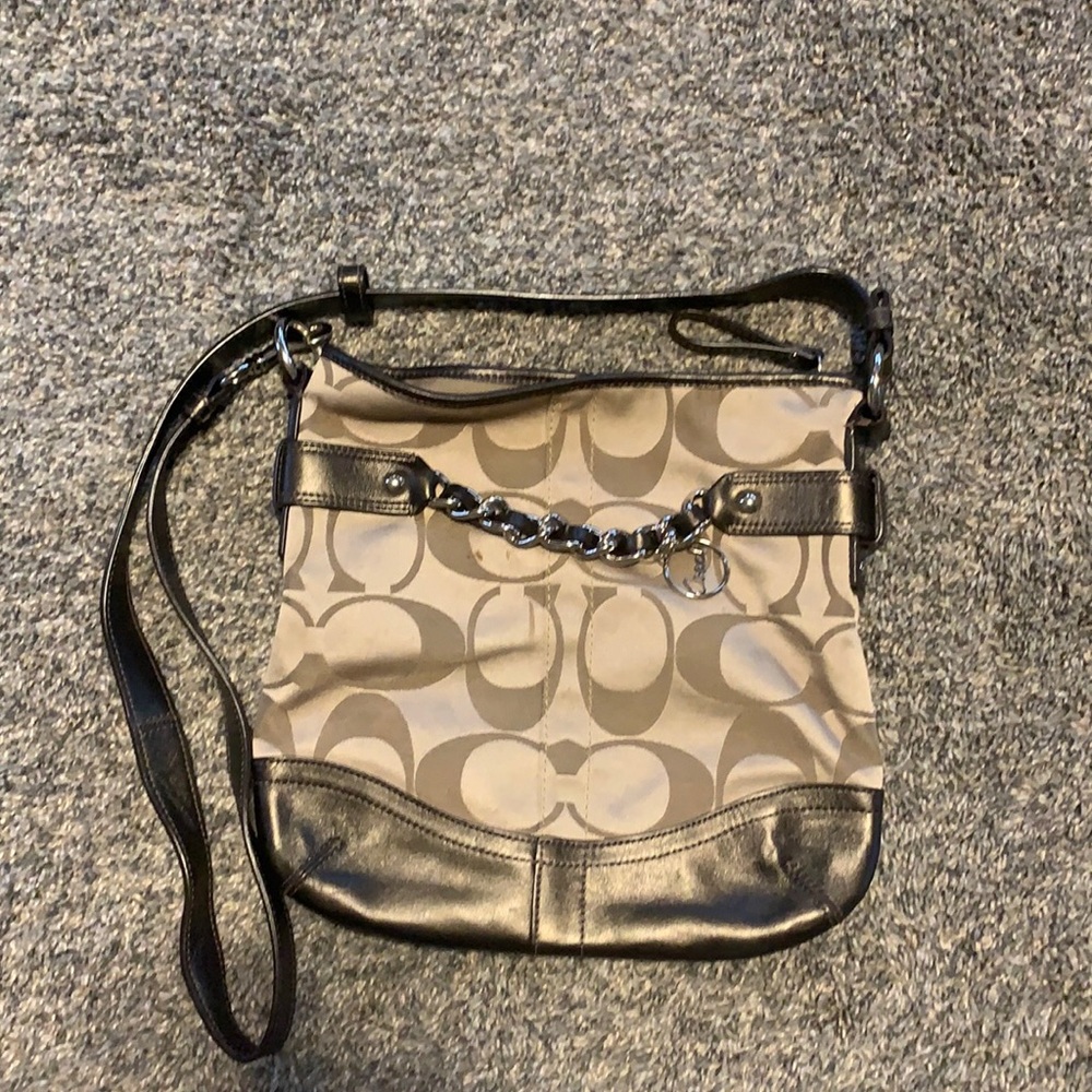 Brown cross body shoulder bag with chain hardware